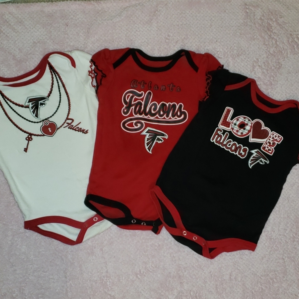 Baby girl lots of Atlanta Falcons onesies